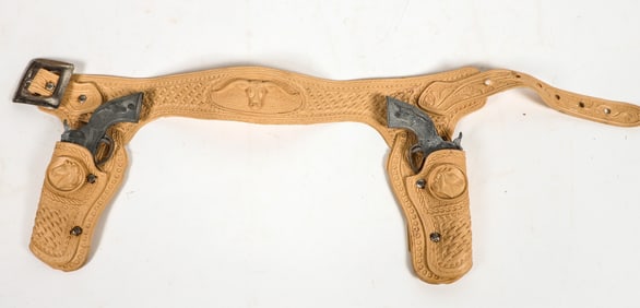 Two Hubley "Tex" cap pistols with rubber Holsters and Belt [196975]