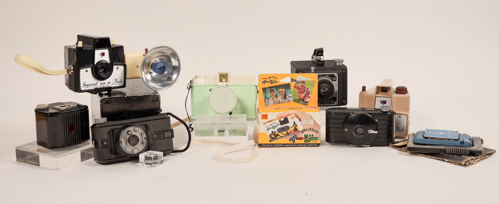 Unusual Modern Camera Mix (9) [186268]: Interesting group of modern cameras, including a few scarce cameras from the "plastic" era. No guarantee on working condition._x005F_x005F_x005F 1. Univex AF, folding pop-out with original box_x005F_x