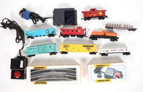 HO Misc. Lot Transformers, Track Rolling Stock [185783]: Lot of 60+. 1. Four Transformers, new never used, one still NIB. Tested and work. 2. Rolling stock: 50'box car, 40' cattle car, tanker, two caboose, bottom dump, gondola, flat lumber car. Track: 50+ c