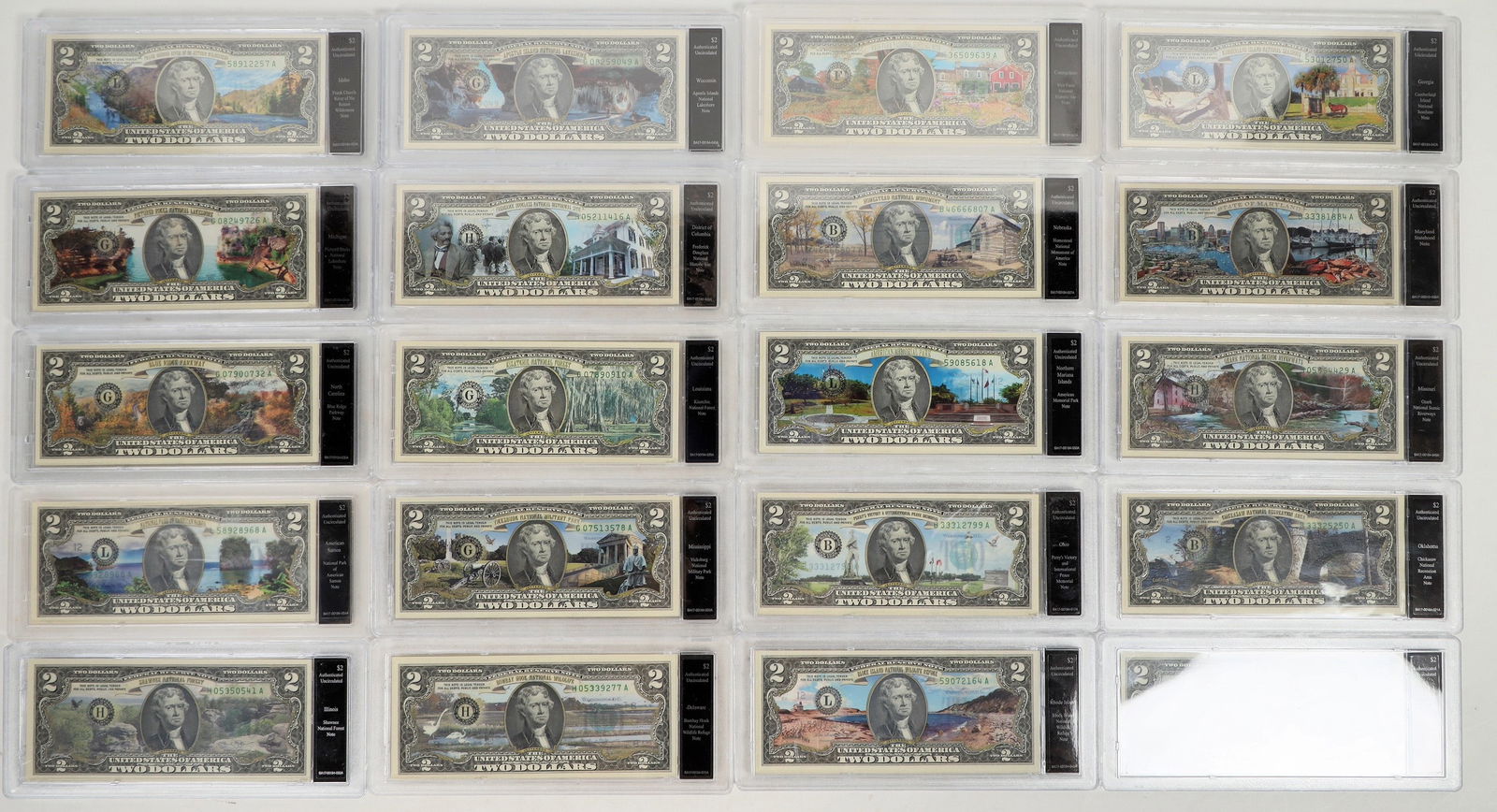 Colorized Two Dollar Bills (20) [198812]: Both The Bradford Exchange and Merrick Mint market these colorized crisp uncirculated two dollar bill commemorating America's National Parks. Here are 20 of The Bradford Exchange in hard plastic cases