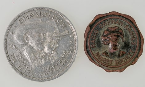 Pictorial Tokens: Irish Cowboys/Orphan Annie [198354]