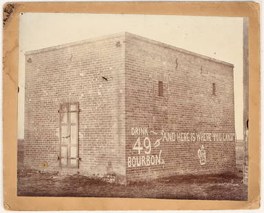 Drink 49er Bourbon and Land in Jail Photo, Williams, CA [197545]: Photograph of the Williams, Colusa County California jail and painted on the wall: "Drink 49 Bourbon and Here Is Where You Land". Dated 1898 on reverse; photo is 5 1/2 x 4 1/2 inches.^Date: Country (i