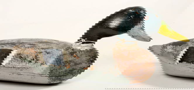 Mallard Duck Decoy 1890-1920's Illinois River Style [197256]: This is a working Mallard duck decoy made in the Illinois River style; saw cut half-way on the body and hollowed-out for buoyancy. Some original paint remains and with glass eyes. The bottom hardware