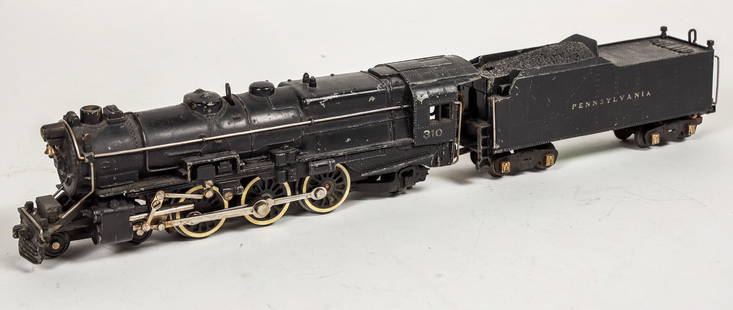 American Flyer Engine 310 And Tender 4-6-2 [183882]: American Flyer 4-6-2 Engine 310 And Tender. "Pennsylvania" graphics readable on tender. Over all condition of body shows some wear. Tested: Light works, motor operated. ^Date: 1950'sCountry (if not US