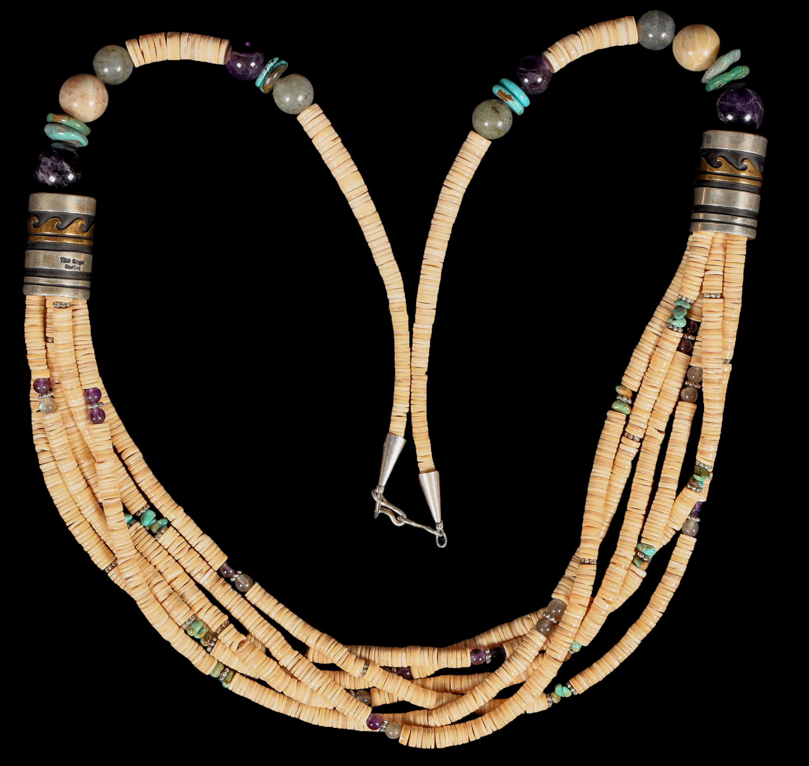 Singer Heshe Bundle Necklace [200082]: This is a T&R Singer Family marked 6 strand Heshe bundle style necklace with the very recognizable Singer style barrels originally used by Silversmith Tommy Singer and still used by the family today i