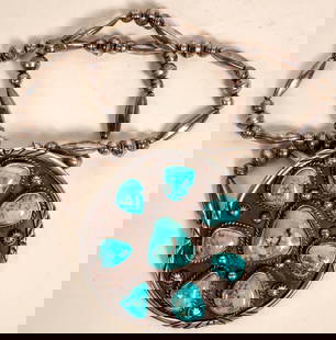 Turquoise Medallion Necklace  [177315]: This is a Navajo made turquoise and sterling silver medallion necklace, the turquoise looks to be of the Kingman Mine in Arizona, the turquoise from the mine typically ranges from light blue to a very