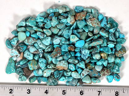 Nevada Treated Turquoise Nuggets, 220g [195959]: Small turquoise nuggets, all treated, ranging from deep green-blue to pale blue in color. Approximate weight 220 grams. Pieces in the lot range from around .25" to .8" in length. This turquoise origin
