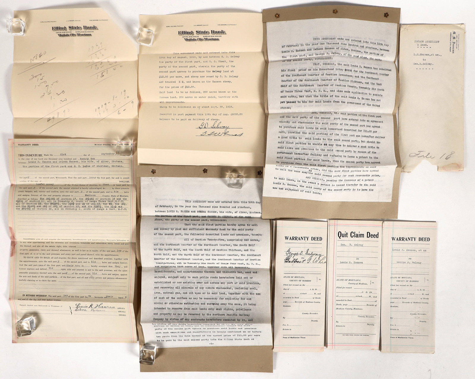 Montana Quit Claims and Other Homestead Ephemera (10) [194509]: Documents concerning a homestead purchase being carried out by Elling State Bank of Virginia City, Montana. The group contains a couple of warranty deeds, a quit claim deed and other documents. All ar
