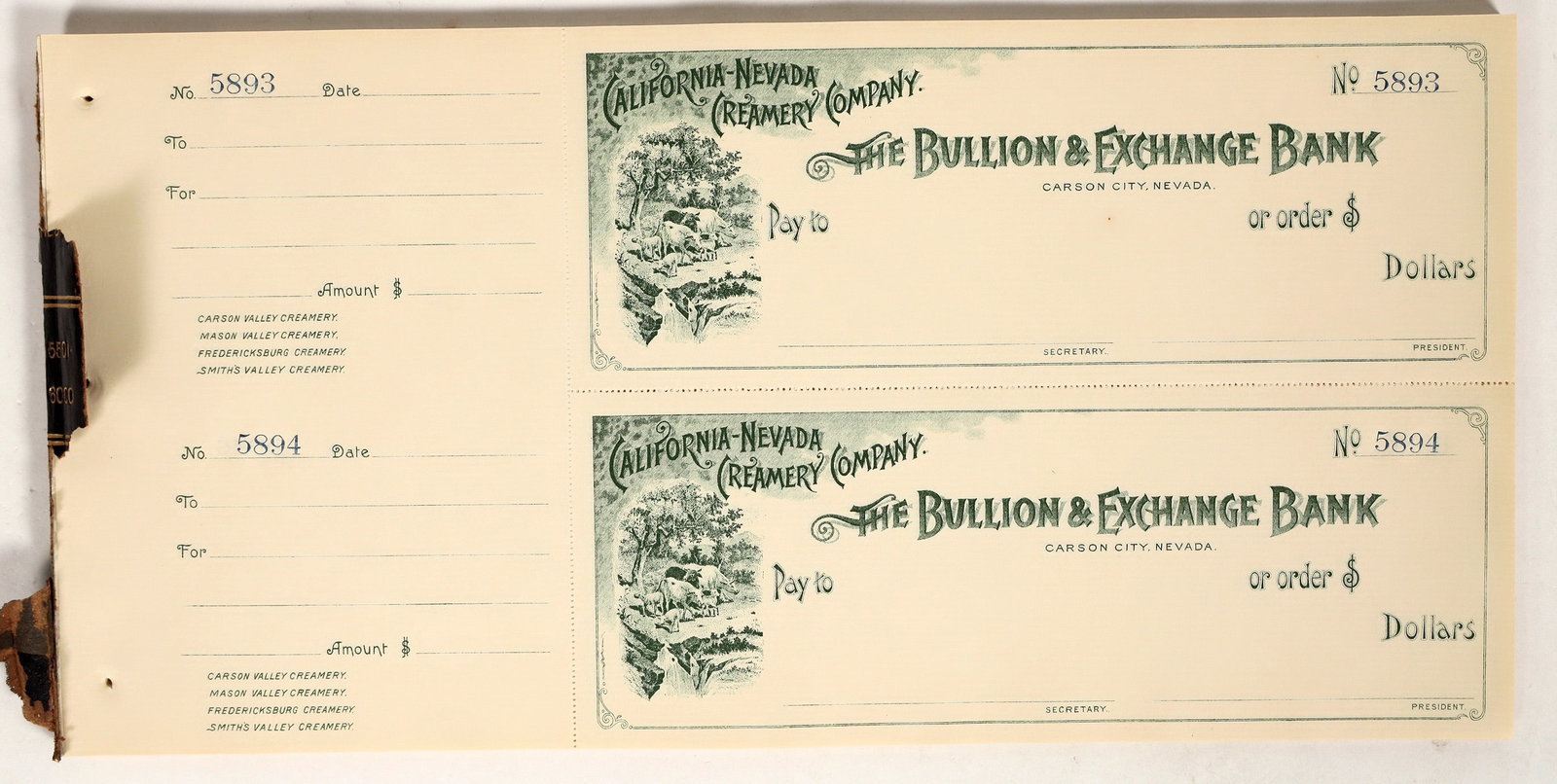 Check Sheets for California-Nevada Creamery Company [197587]: Sheets of unused pictorial checks. 50 sheets of 2 checks each with vignette of livestock, Bullion & Exchange Bank. Stubs on checks list the properties managed by this company, including Carson Valley 