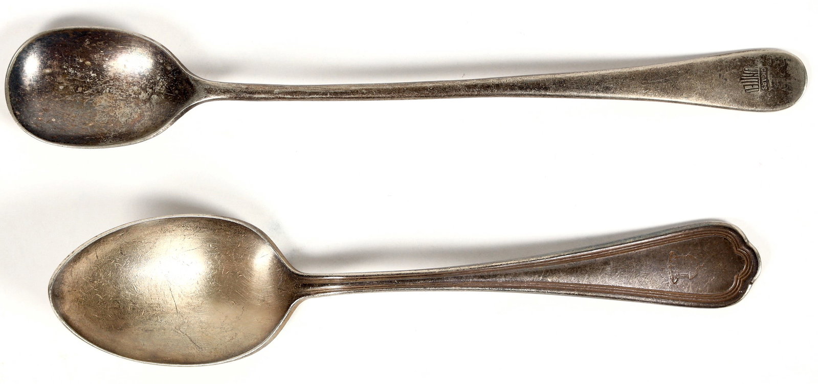 Advertising Spoons Pair [202295]: Pair of advertising silver spoons. First is from the Greenbriar Hotel of West Virginia, marked Blackstone Silver Co. on the reverse side of the handle. Measures approx. 7" long. The Hotel is a Nationa