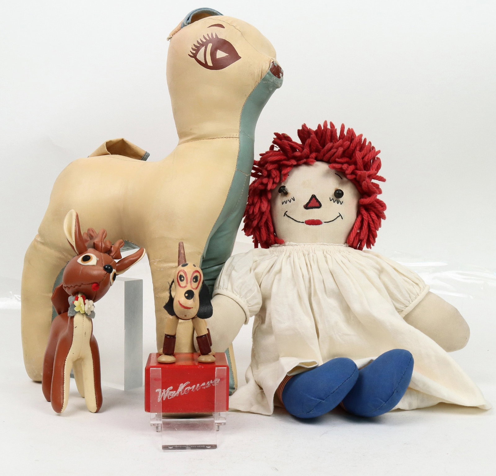 1940s Toys: Raggedy Anne and Delightful Puppet Dog! [199902]: Toys dated to the 1940s. Includes a Raggedy Anne doll in very good condition (12" tall), a deer doll (13" tall), a smaller deer (6" tall), and a very spectacular functioning jointed dog toy -- "Triang