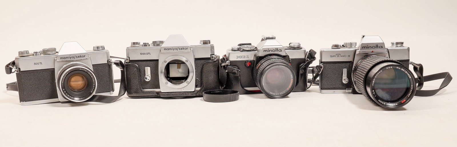 Camera Quartet (4) [186332]: Two and two 35mm cameras. They include:^Date: Country (if not USA): State: City: Provenance: