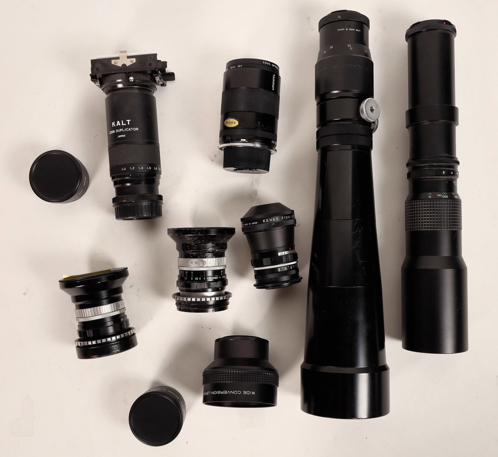 Modern Japanese Camera Lenses (10) [187952]: Group of ten camera lenses from various Japanese manufacturers.^Date: Country (if not USA): State: City: Provenance: