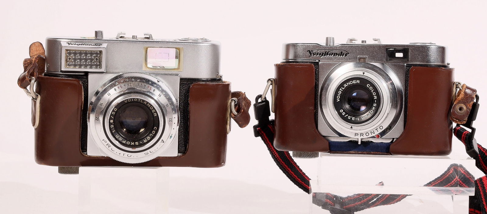 Voigtlander Camera Pair [186252]: Vitomatic 1, color skopar, 2.8/50. Appears about new. dark leather case. No guarantee on working condition.^Date: Country (if not USA): State: City: Provenance: