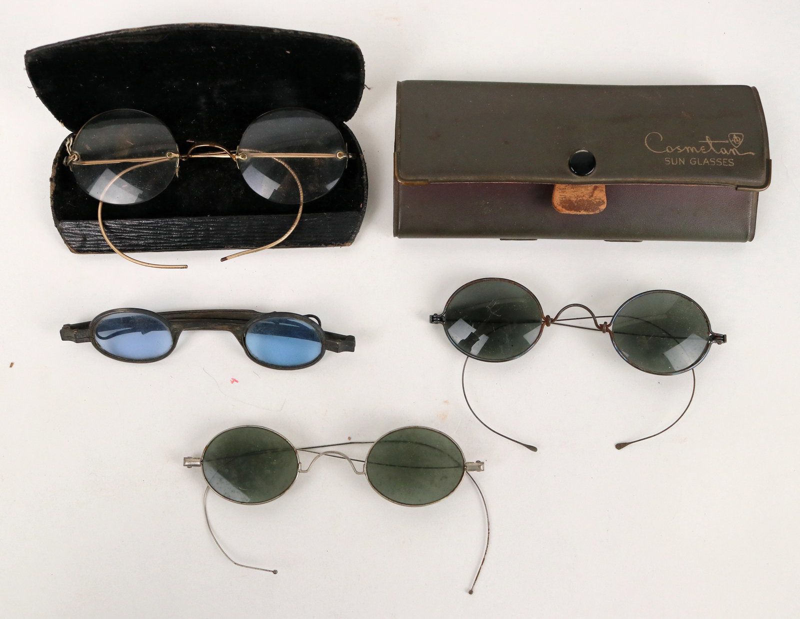 Eye Glasses (4) [189855]: This lot has four pair of vintage eyewear. There are no nose pieces. Several are sunglasses, one pair has bi-focal capacity. You can look the part of the Chautauqua character that you need to be.^Date