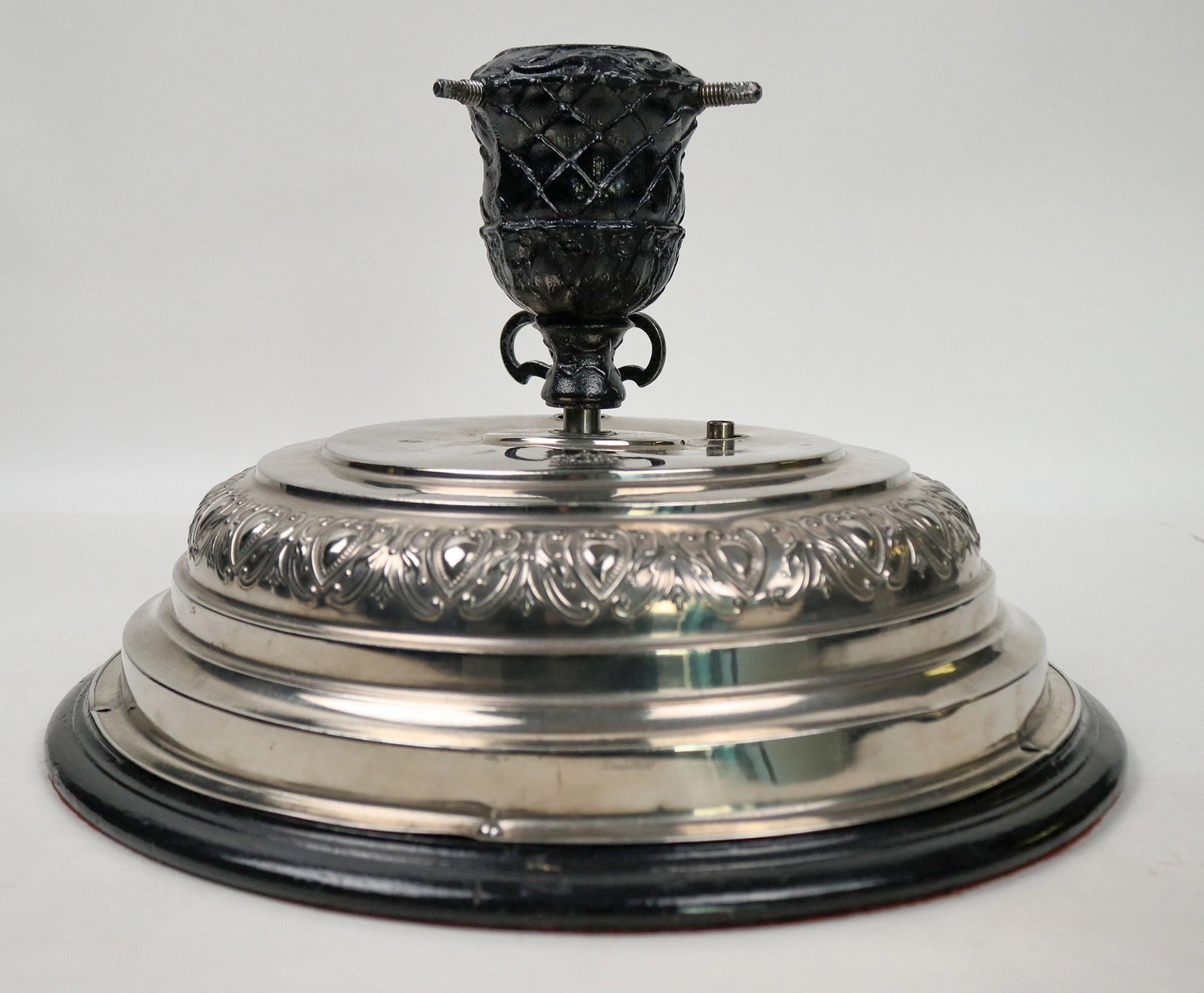 Christmas Tree Musical Wind Up Base [193881]: This is an unusual item. It is a c. 1920 wind up musical base with key in working order with a rotating small cast iron Christmas tree holder. There is a "Germany/Trade Mark" on the upper base. In our