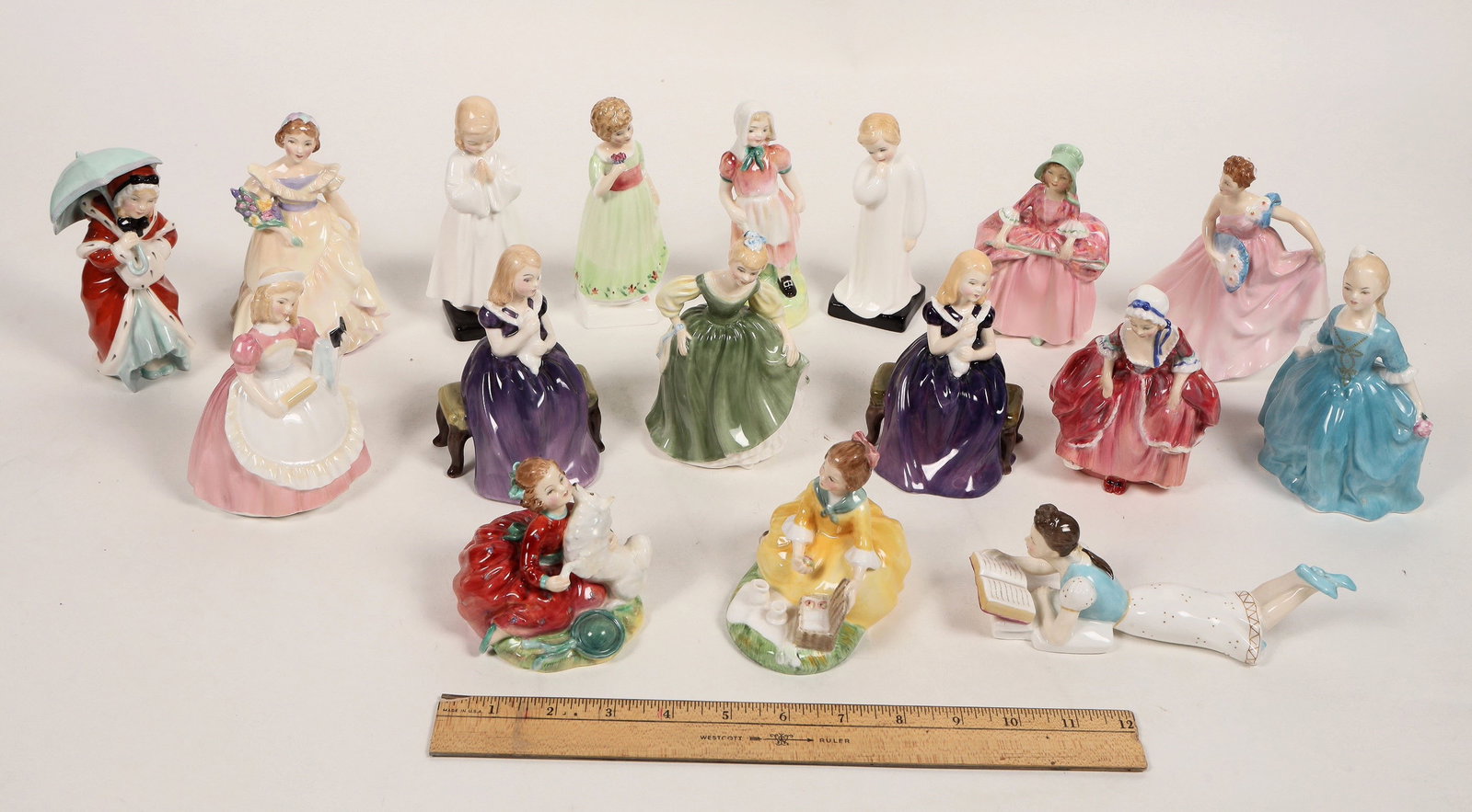 Royal Doulton Figurines, c1930s-80s (17) [191821]: A collection of 17 Royal Doulton fine porcelain figurines, made in England, c1930s-80s. This group features medium size pieces up to 7" tall. The lot includes: Tess, Jill, Bo-Peep, Faraway, Invitation