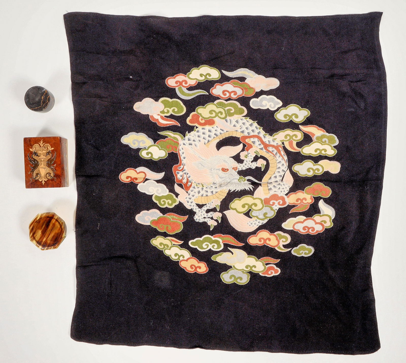 Container Pair, Silk Scarf and More [195781]: Nice c. 1910 hinged wood box with hand painted inlay style motif, 1.75x2.5x1". Tortoise shell container with cap, 2.75x1". Dark stone sealer knob, 1x1.25". 15x15" silk scarf.^Date: Country (if not USA