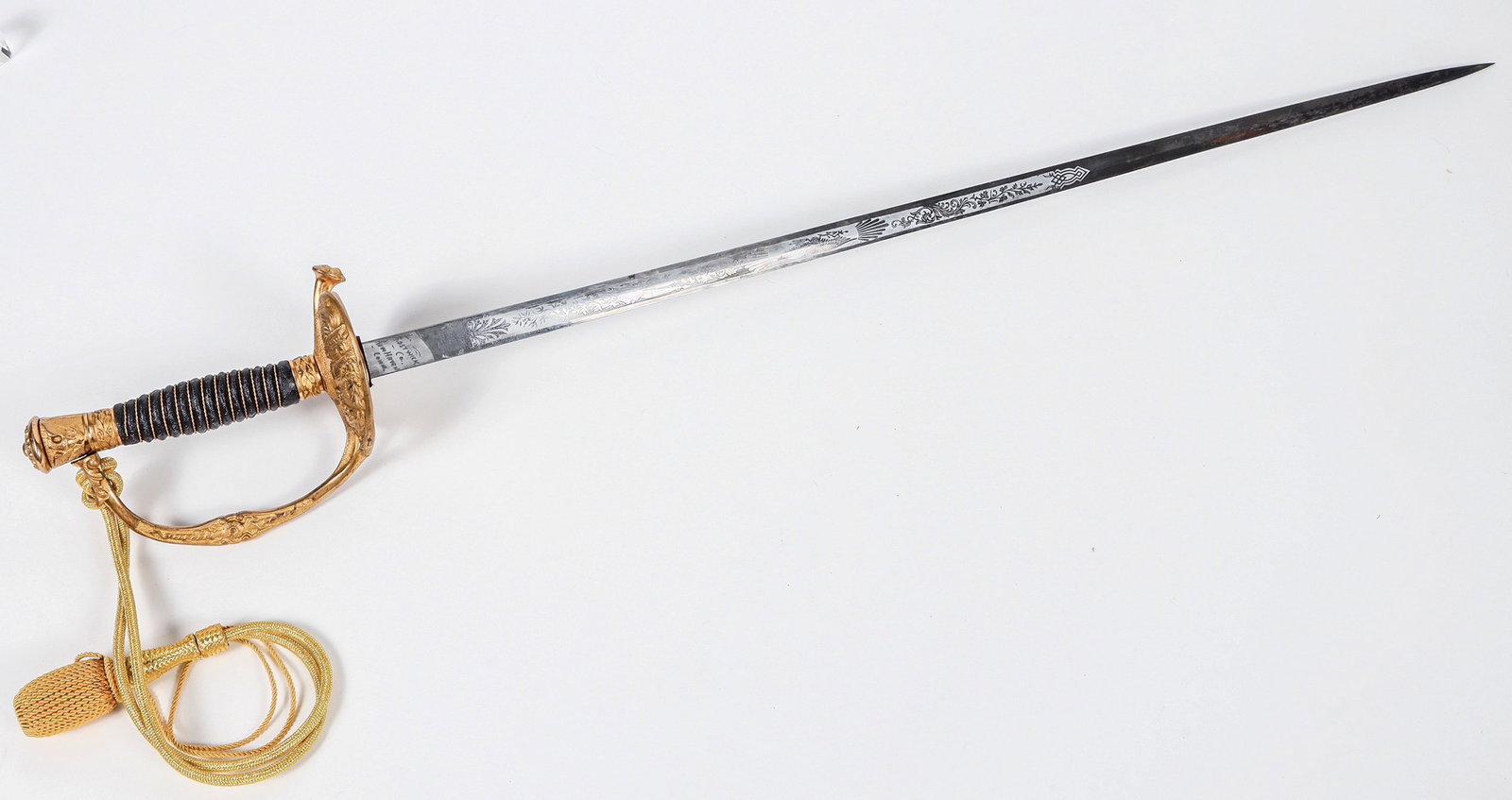 Civil War Officer's Sword with Scabbard 1860s [201000]: This is an Officer's dress sword post Civil War design. At 36 in. in length made by Bostwick Co. of New Haven, Conn. marked on the ricasso. The sword is etched to "Lieut. C. L. Burton". The scabbard a