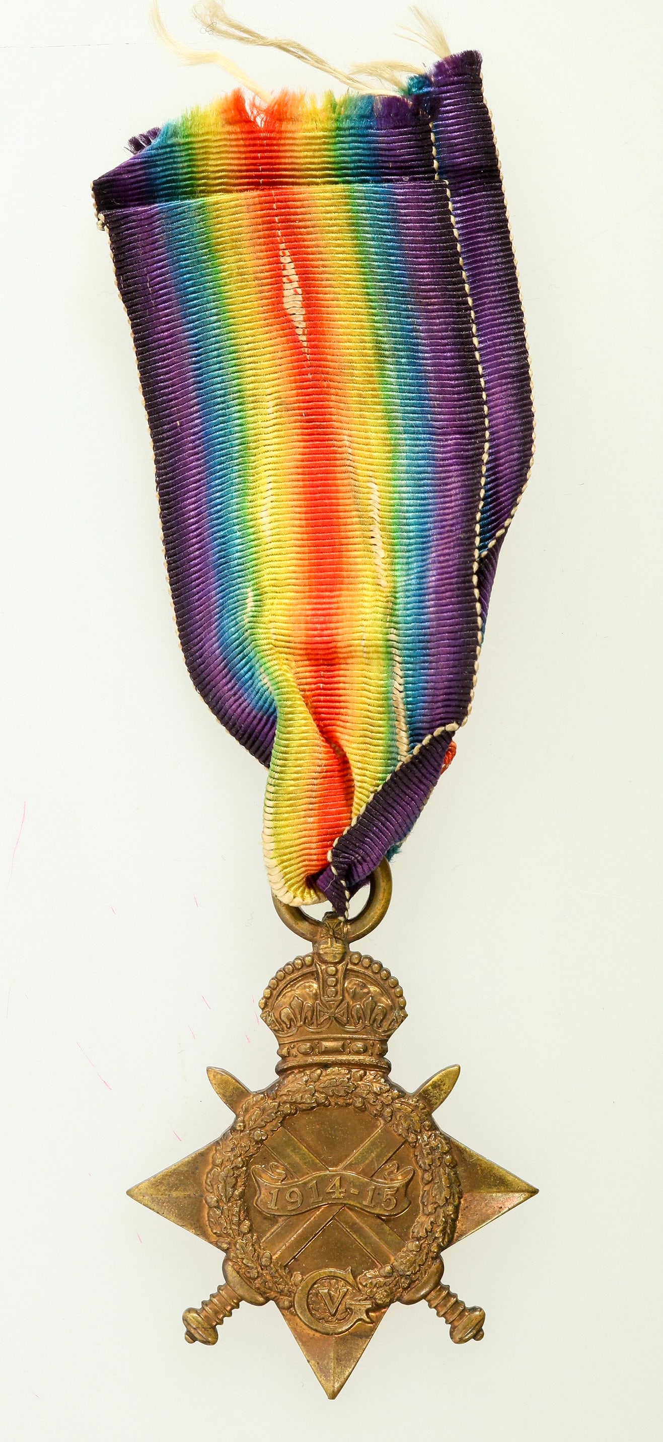 George V Military Decoration 1914-15 [200295]: Bronze medal with multi colored ribbon. Medal is 45 x50 mm. Obverse has the crown, crossed swords, 1914-15, G V. Engraved on reverse: 109287 / SPR.F.R.BUTCHER / R.E.^Date: Country (if not USA): United