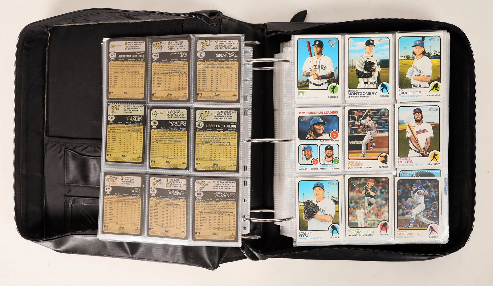 Large Baseball Card Collection (900+) [187949]: A large binder filled with close to 1000 Topps, Donruss and other brand baseball cards. Players of past and resent grace this mammoth binder that has 111 two sided pages. Players include players like 
