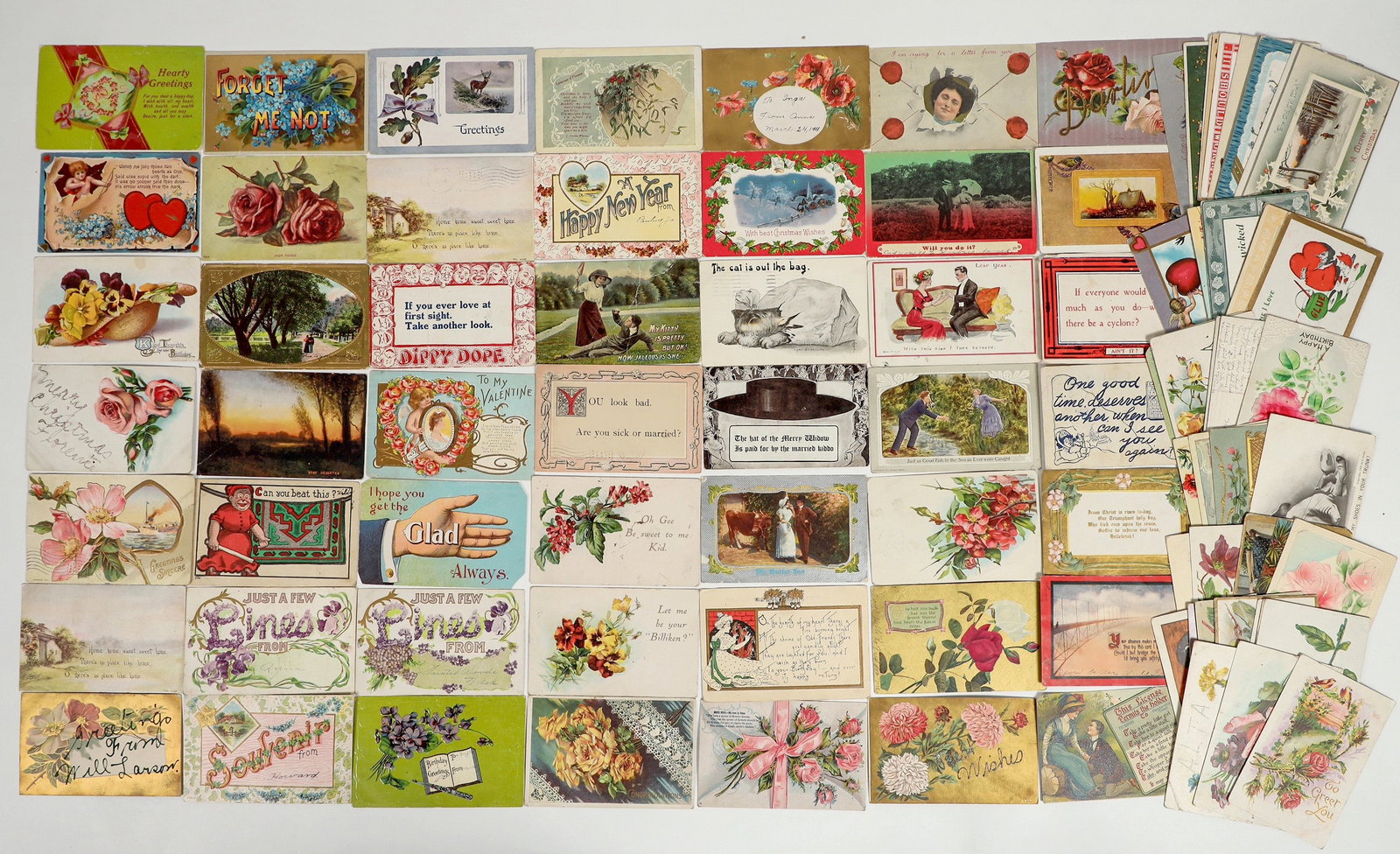 Humorous Postcards Circa 1906-1912 (89) [200779]: This is a lot of 89 humorous postcards featuring jokes with vintage floral designs and some with goofy characters. Postcards are colorful and have no tears or major stains. Circa 1906-1912.^Date: Coun