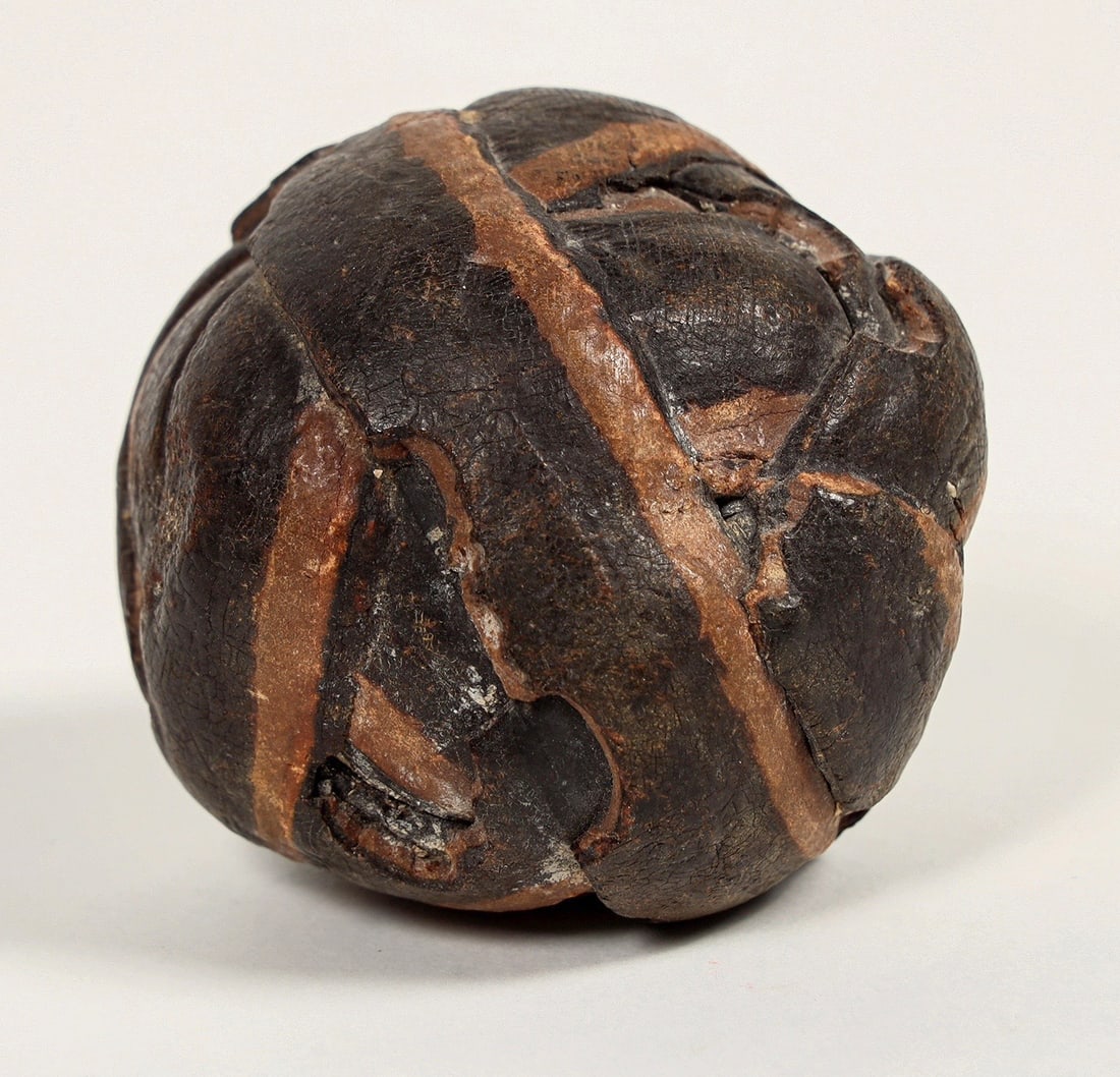 Chickasaw Stick Ball or Towa c.1920's [200495]: This leather wrapped ball known as a towa by the Chickasaw people is used in the game of stickball. The ball is thought to be made of snapping turtle sinew. At 2.5 in. and very dense. The kapucha stic
