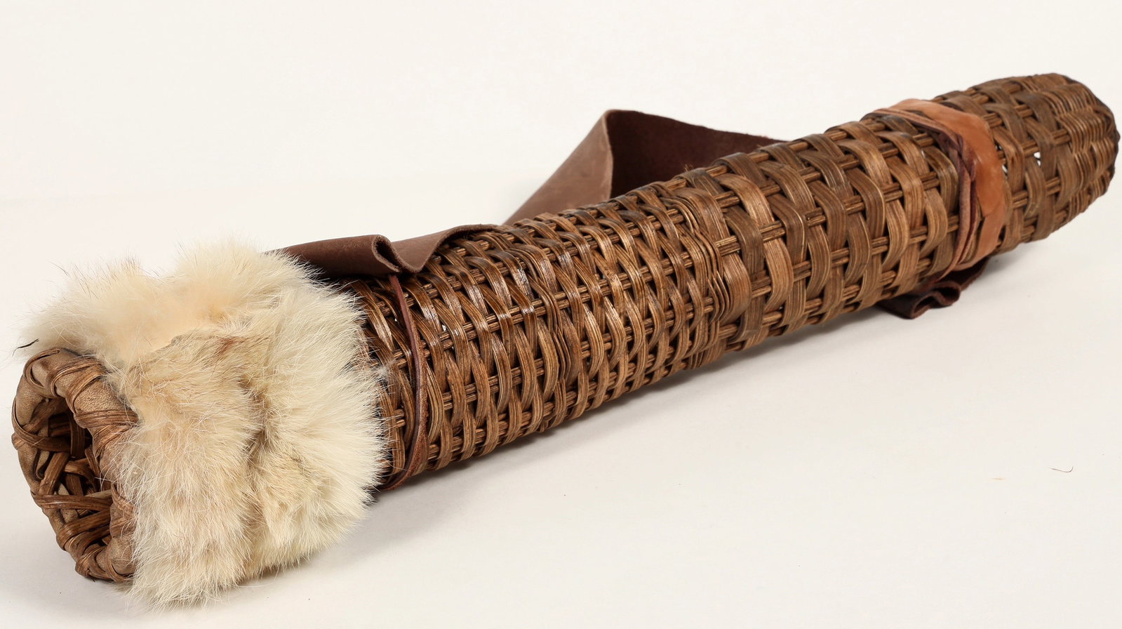 Cherokee/ Choctaw Rivercane Quiver c.1900 [200498]: This is a Cherokee/ Choctaw arrow quiver made from rivercane. It measures 23.5 in. in length. There are three types of reed or cane used in this project as well as parfleche for a base. The top is coy