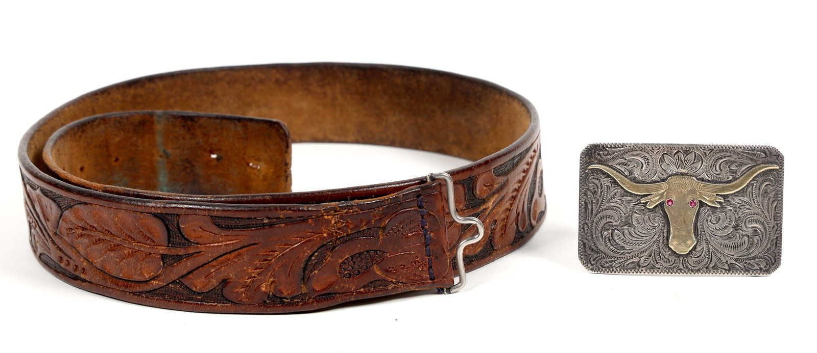 Sterling Silver, Gold and Ruby Steer Head Belt Buckle / Belt [204798]: Sterling Silver, Gold and Ruby Steer Head Belt Buckle / Engraved brown leather belt. This is an authentic cowboy belt and buckle from the Comstock! Made for a very skinny or young cowboy. 2.75 x 1.75 