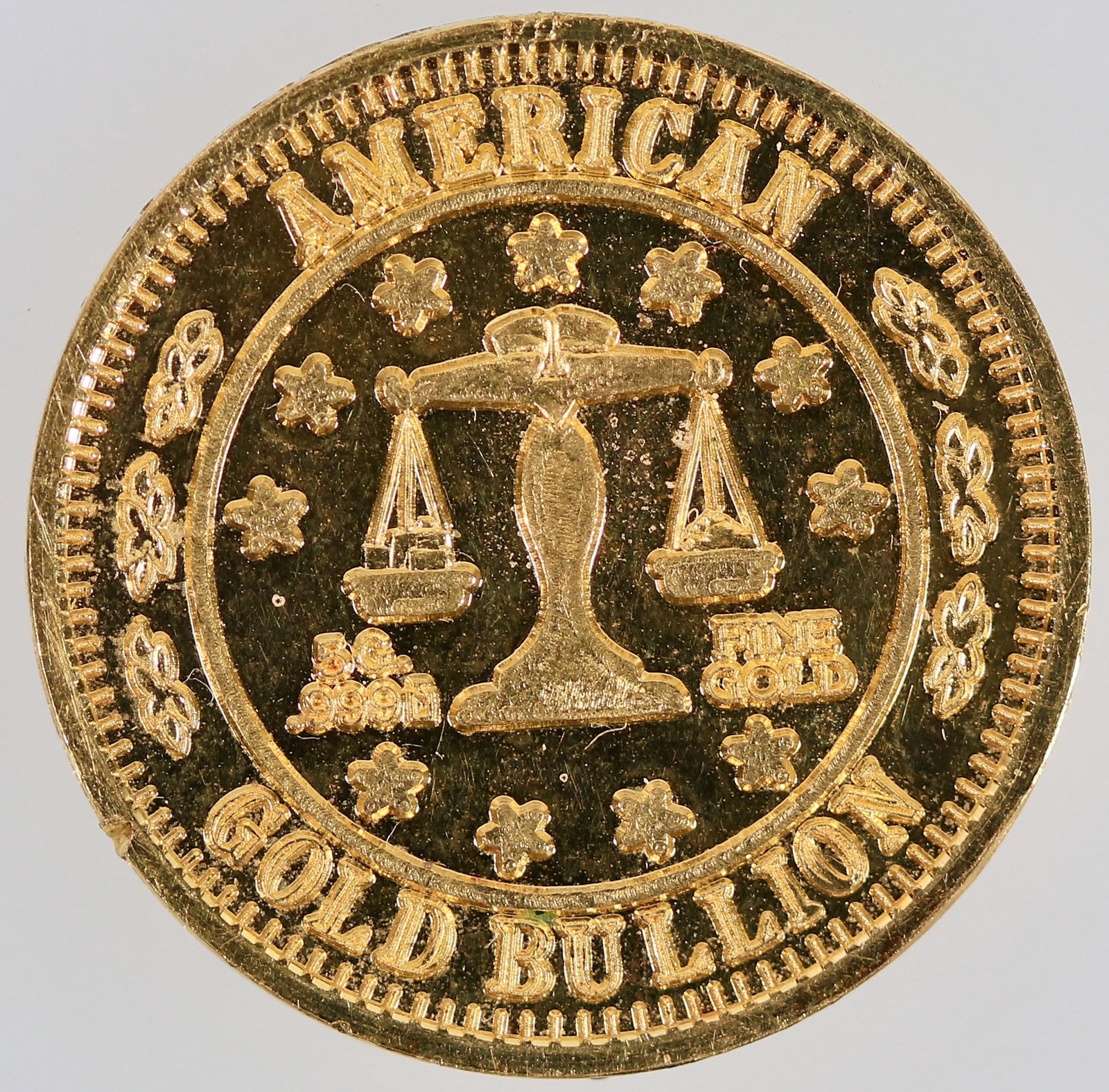 American Gold Bullion Coin [204989]: American Gold Bullion Coin / 5 gr. / .999 / Fine Gold. Scales of Justice obverse; spread eagle reverse. 20 mm; 5 grams. ^Date: Country (if not USA): State: City: Provenance: