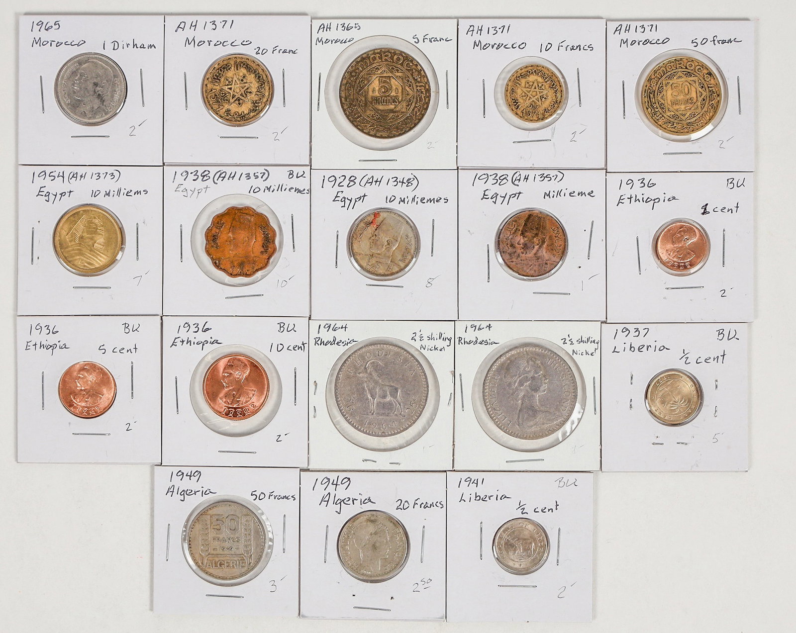 Coins of Africa (18) [201027]: Coins from six African countries: Algeria 1949 20 francs; 1949 50 francs. Liberia: 1937 1/2 cent; 1941 1/2 cent. Rhodesia 1964 2 1/2 shilling (2). Ethiopia 1936 1 cent; 1936 5 cent; 1936 10 cent. Egyp