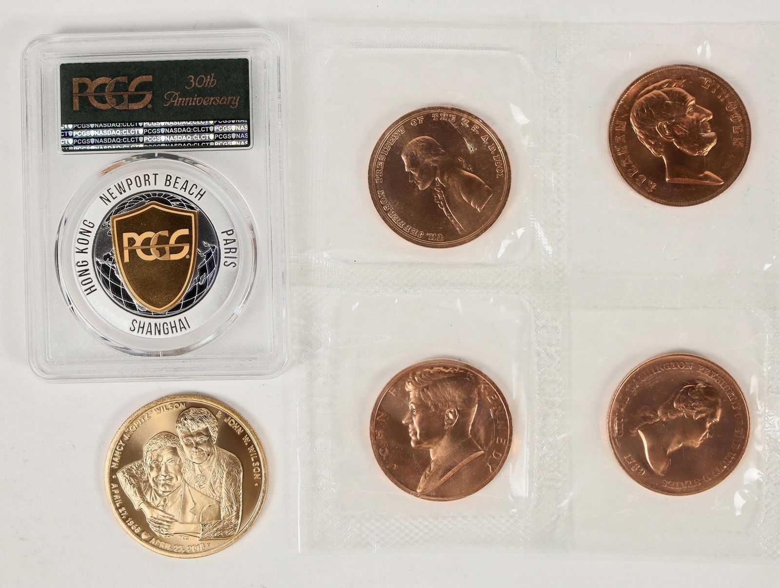 Medal Collection (6) [203520]: Six brilliant uncirculated medals: 1) Deluxe Guardhouse case (4 x 5 x 1 inch) with a David Hall autographed PCGS 30th Anniversary medal from 2016. 2) John & Nancy Wilson Santa Claus medal from 2018. 3