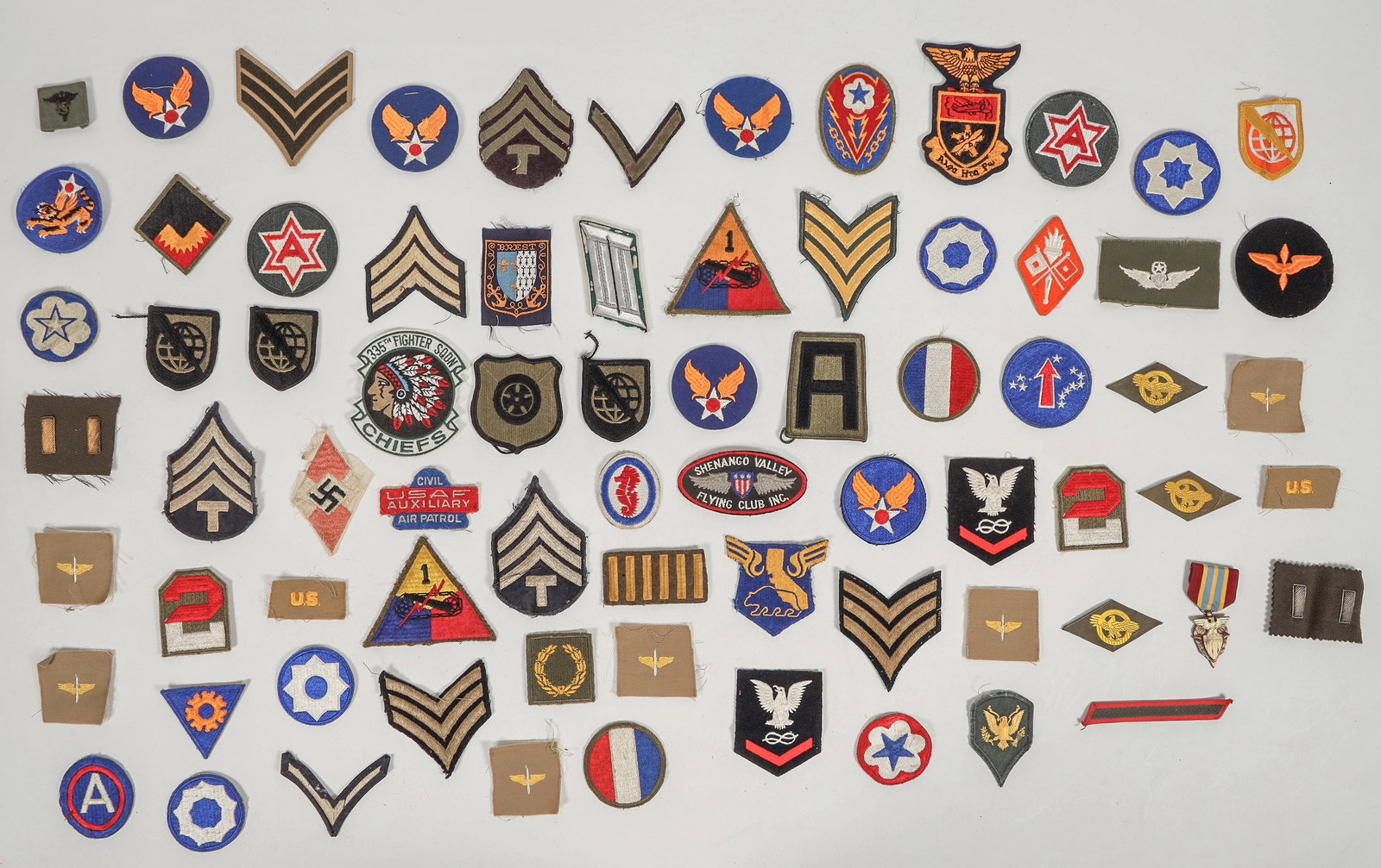 Wooden Cigar Box with Military Patches & Badges [204215]: Wooden cigar box of Dons Don Rey (9 x 8 x 3 inches) with Defense Supply Agency award pin for meritorious service; 73 miscellaneous cloth patches including: Shenango Valley Flying Club, USAF Auxiliary 
