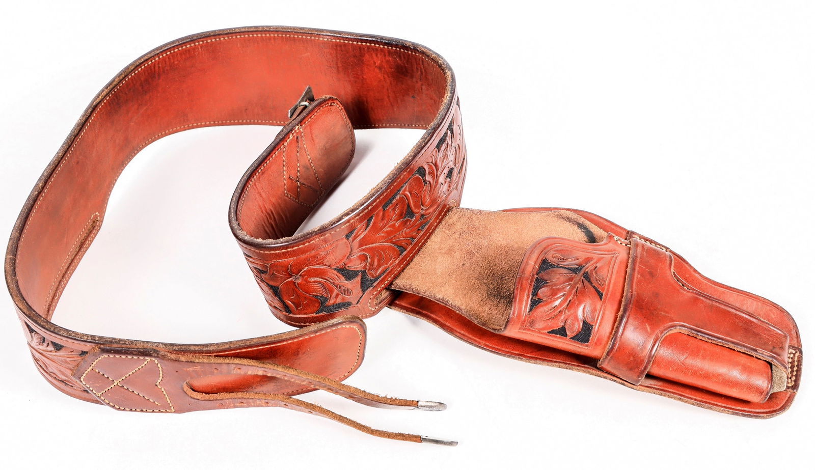 Hand Tooled Leather Holster/Belt [202754]: Hand Tooled Leather Holster/Belt, brown leather , nice tooling, initials "LRJ", second "slot" for a second firearm, tiedowns.. The holster is designed for a 4" barrel. Excellent cond., 42" end to end.