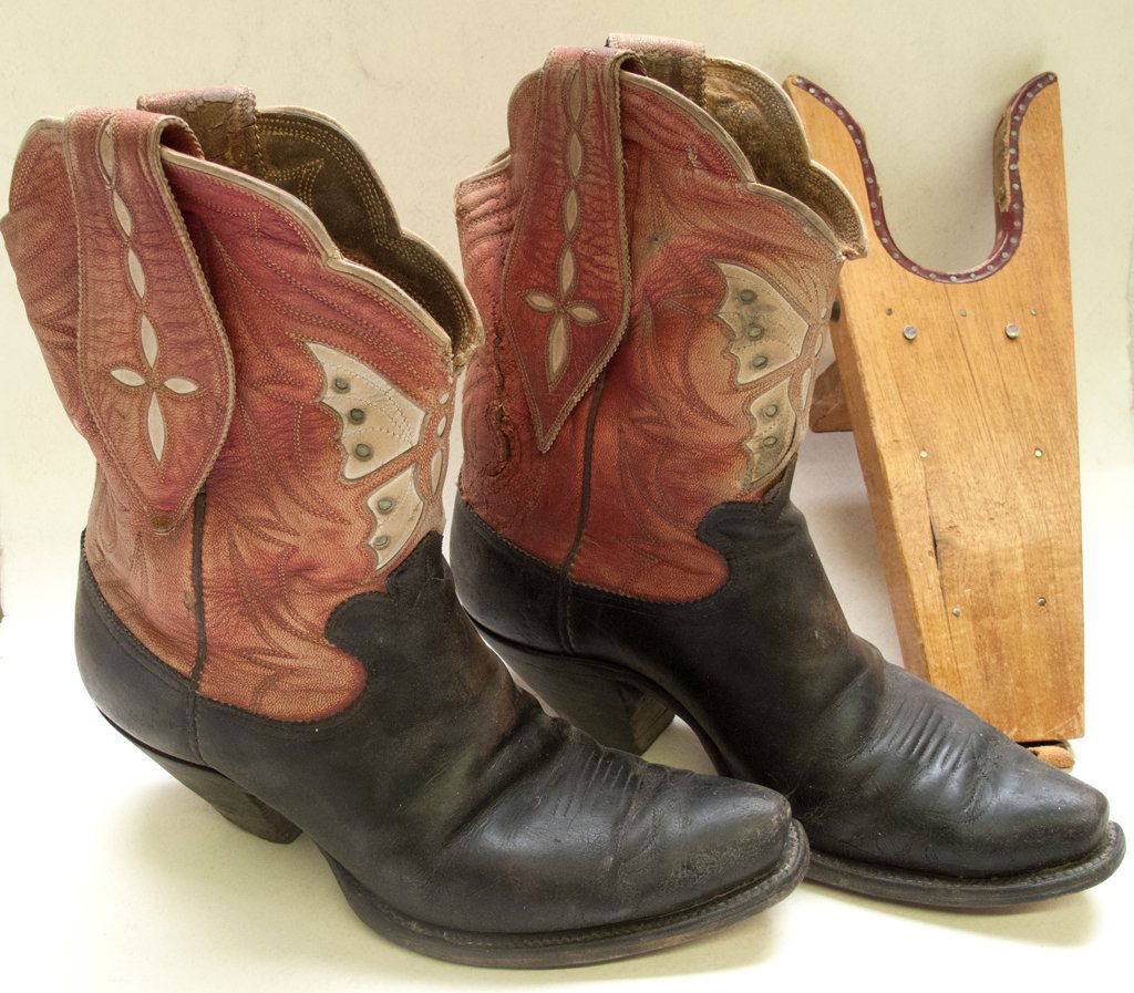 Western Boot Company ladies boot: Although worn, a nice pair of old boots from the Western Boot Company of Tucson, Arizona. Red (faded), white, and black. Unknown size and date. Includes a device to help get the boots on AND THE ORIGI