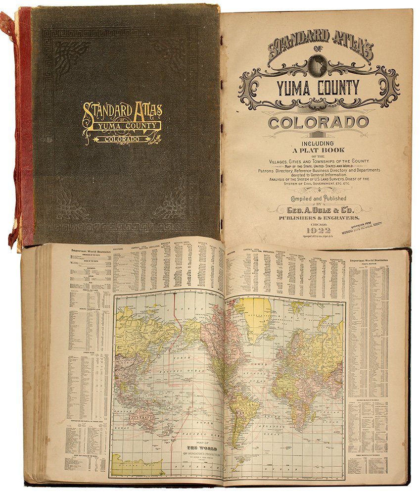 Standard Atlas of Yuma County Colorado: Large atlas of the "Villages, cities and Townships of the County, including a Plat Book." Compiled by Geo. A. Ogle & Co. Large 15.5"x18" 81-page volume, with color maps, a map of the US, Patrons and R