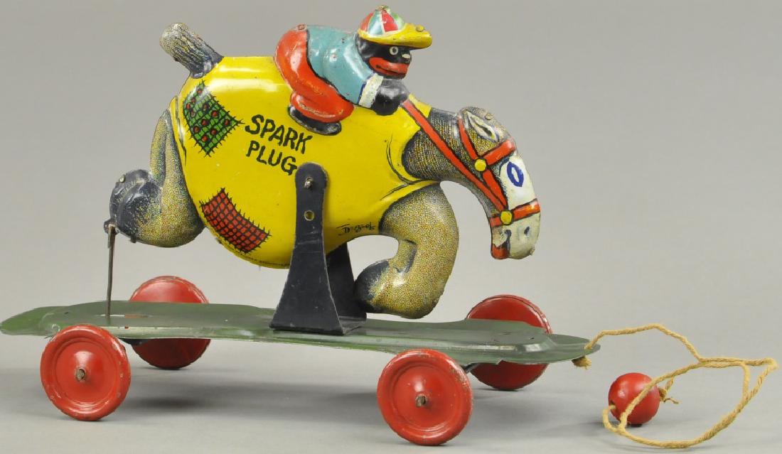 SUNSHINE RIDING SPARK PLUG PULL TOY (1 of 2)