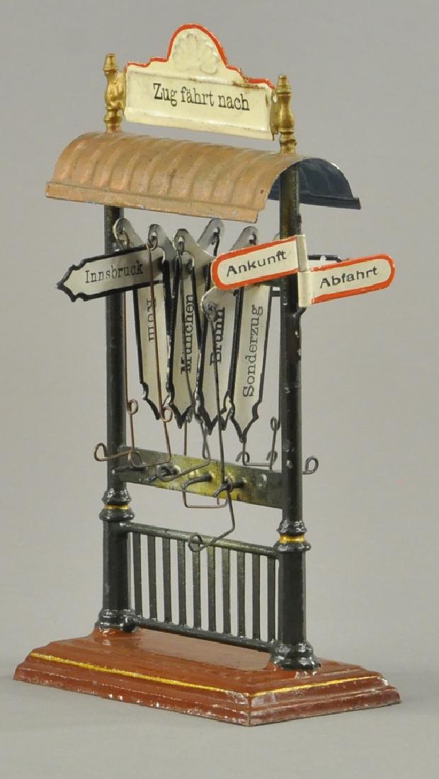 MARKLIN DESTINATION BOARD - GERMANY: German hand painted destination board with European cities; Sonderzug, Rom, Budapest, Eger, Prag, Brunn, and Munchen, has two smaller signs on outside of one post, one sign says "Ankunft" and the othe