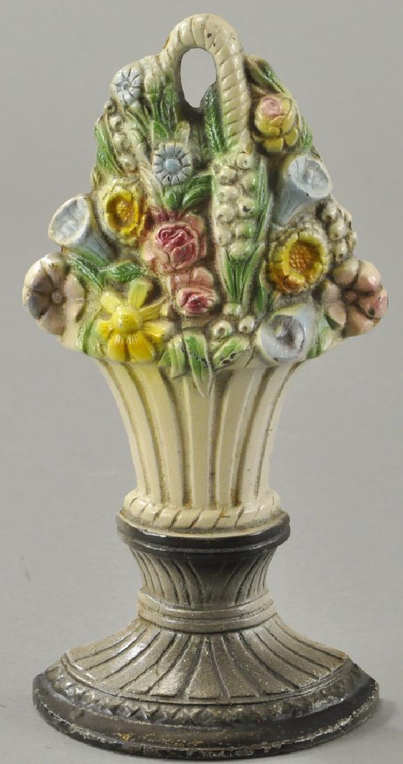 MIXED FLOWER BASKET DOORSTOP - '14CC' ON BACK. (1 of 2)