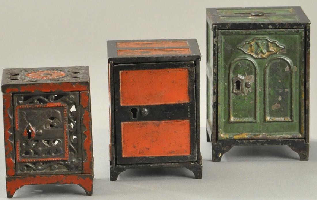 THREE EARLY PAINTED SAFE STILL BANKS (1 of 3)