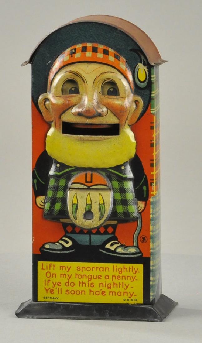 SCOTSMAN TIN MECHANICAL BANK (1 of 3)