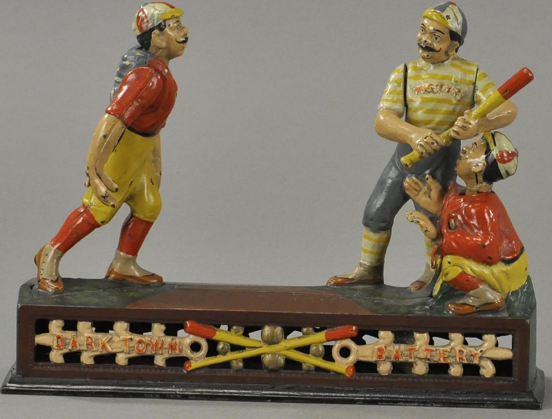 DARKTOWN BATTERY MECHANICAL BANK (WHITE FACES) (1 of 2)