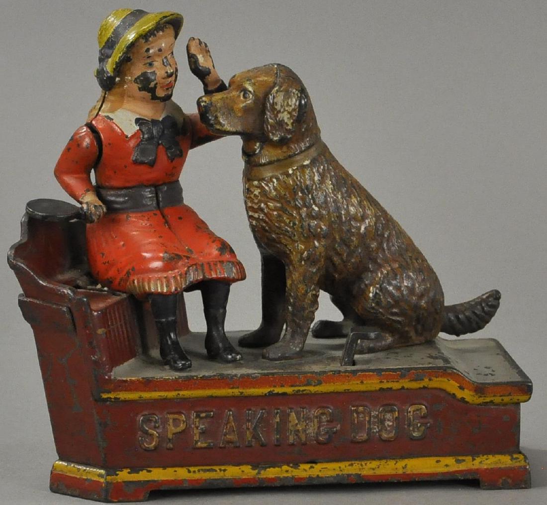SPEAKING DOG MECHANICAL BANK (RED DRESS) (1 of 2)