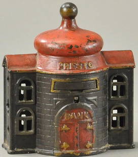 PRESTO MECHANICAL MECHANICAL BANK: Kenton Hardware Co., Ohio, c. 1892, cast iron japanned, pressing button releases drawer for coin deposit, close and re-open to find empty and ready.