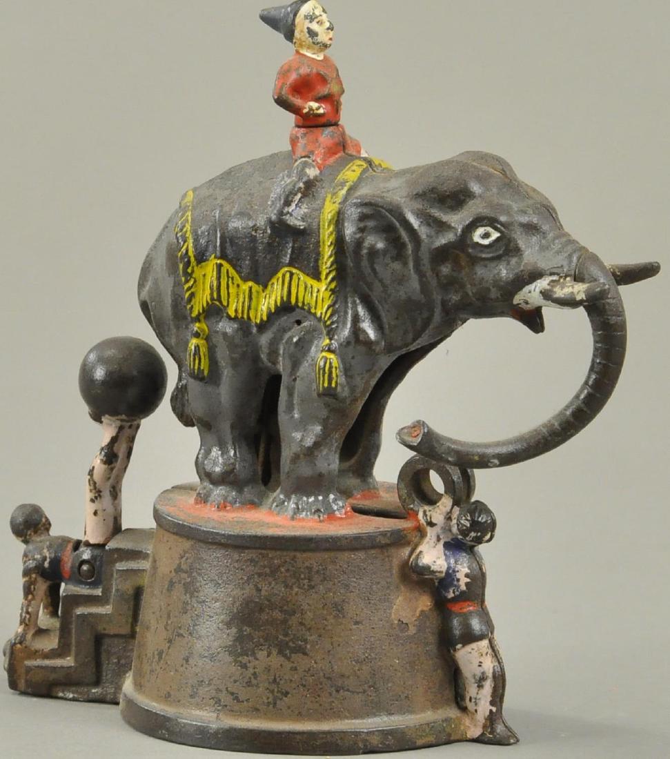 ELEPHANT AND THREE CLOWNS MECHANICAL BANK (1 of 2)