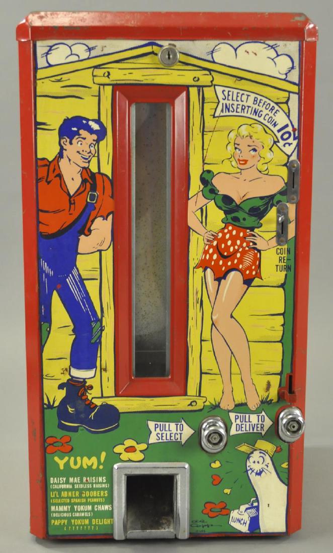 LI'L ABNER DOGPATCH VENDING MACHINE: A "Vendor-Bar" for Daisy Mae Raisins, Li'l Abner Goobers, Mammy Yokum Chews and Pappy Yokum Delights, fantastic comic cartoon images are adhered to front and both sides, the machine is in perfect work