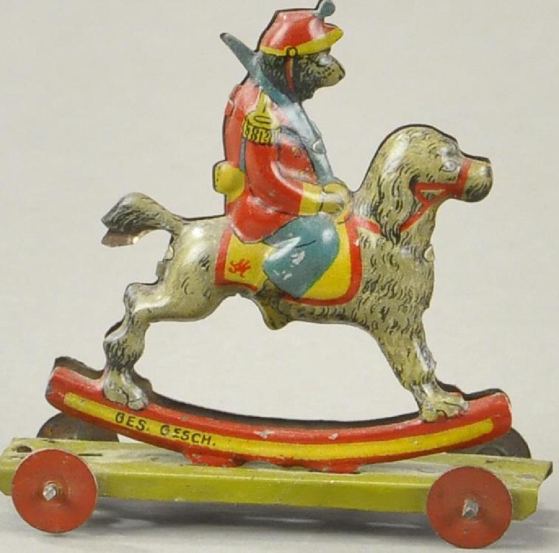 MEIER MONKEY SOLDIER ON DOG PENNY TOY (1 of 2)