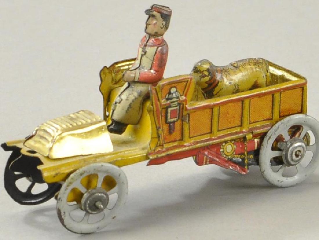 MEIER DELIVERY TRUCK WITH SHEEP PENNY TOY: Germany, lithographed tin, very graphic depiction of early transportation, sheep stands in open bed, seated driver. 3 1/4" l.