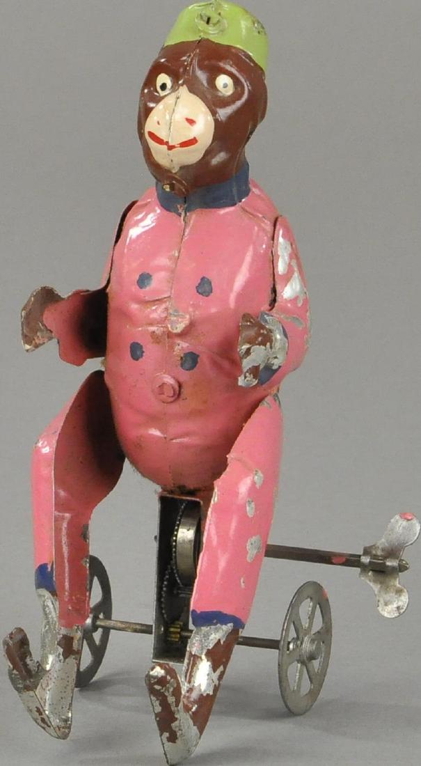 MONKEY ON CLOCKWORK CART (1 of 3)