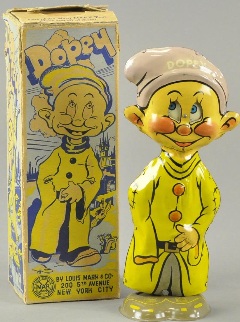 BOXED MARX DOPEY WADDLER: Walt Disney Enterprises, lithographed tin, clockwork activated, eyes flutter when walking, great colors and graphics. 9" h.